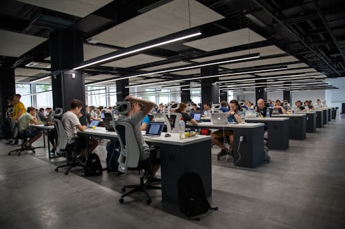 Students collaborating at the CodeStorm hackathon